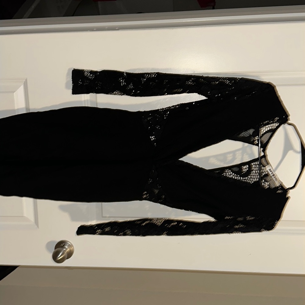 This dress is very elegant with lace and stretches from the hips down, V neck